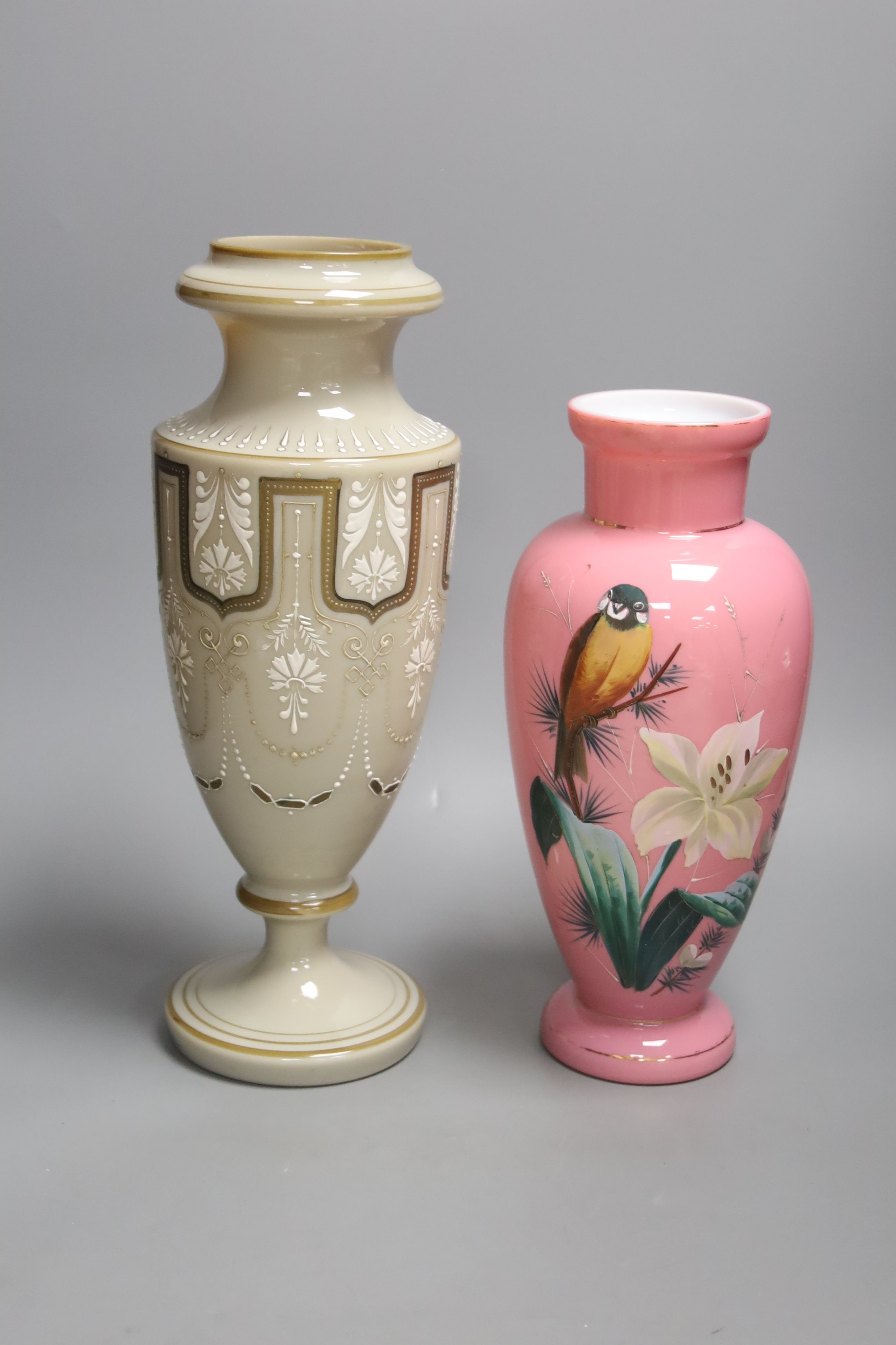 Two 19th century French enamelled glass vases, tallest 38cm